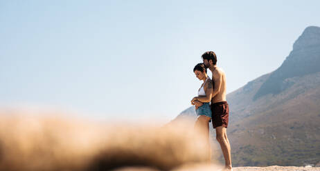 Couple enjoying hillside view, Chas de Egua, Portugal - Stock
