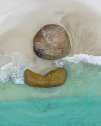 Aerial view of Rocks on the shoreline in Little Beach, Nanarup, Western Australia, Australia. - AAEF16495