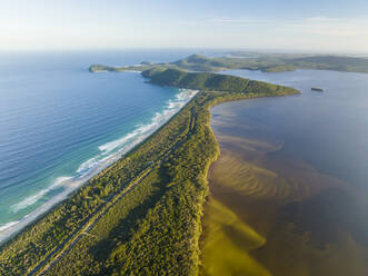 Aerial view of Wallis Lake and the Seven Miles Beach at sunset, New South Wales, Australia. - AAEF16513