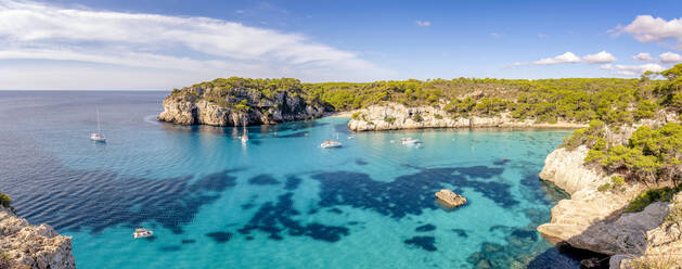 Spain, Balearic Islands, Menorca, Panoramic view of Cala Macarelleta bay in summer - SMAF02363