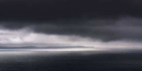 UK, Scotland, Panoramic view of dark dramatic clouds over Saint Magnus Bay - SMAF02460