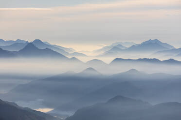 Germany, Bavaria, Jachenau, View from Herzogstand mountain at foggy dawn - FOF13195