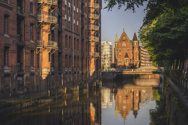 Germany, Hamburg, Speicherstadt district at dusk - KEBF02503