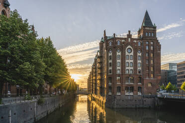 Germany, Hamburg, Speicherstadt district at sunset - KEBF02505