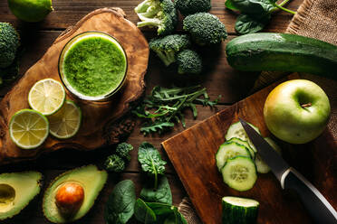From below top view of ingredients for a detox juice on wooden table - ADSF40770