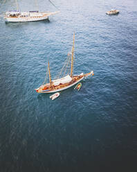 Aerial view of a sailboat in Port Andratx, Mallorca, Isla Baleares, Spain. - AAEF16867