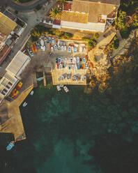 Aerial topdown view of Sant Elm small Harbour, Mallorca, Isla Baleares, Spain. - AAEF16885