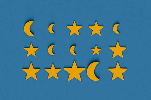 Three dimensional render of rows of yellow stars and crescent moons flat laid against blue background - GCAF00226