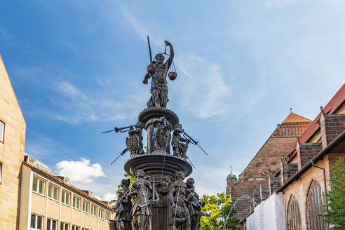 Germany, Bavaria, Nuremberg, Statues of 16th century Tugendbrunnen fountain - TAMF03643