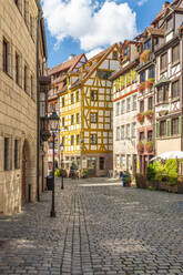 Germany, Bavaria, Nuremberg, Historic houses along Weissgerbergasse alley - TAMF03653