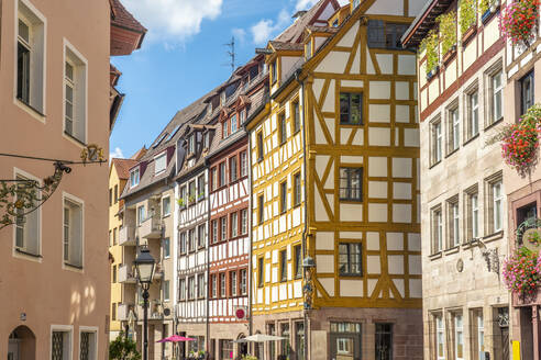 Germany, Bavaria, Nuremberg, Historic houses along Weissgerbergasse alley - TAMF03654