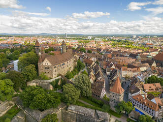 Germany, Bavaria, Nuremberg, Aerial view of Nuremberg Castle and surrounding old town - TAMF03691