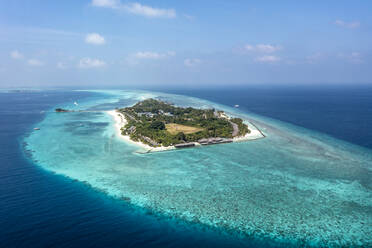 Aerial view of Lhaviyani Atoll under blue sky on sunny day - AMF09693