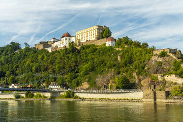 Germany, Bavaria, Passau, Veste Oberhaus fort overlooking Danube river in summer - TAMF03746