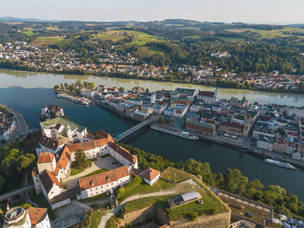 Germany, Bavaria, Passau, Aerial view of Veste Oberhaus fort and surrounding old town - TAMF03784