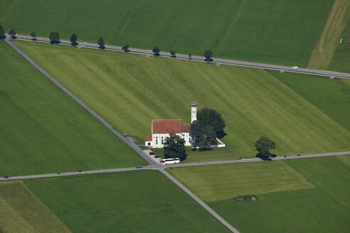 St Coloman pilgrimage church amidst green field - WIF04658