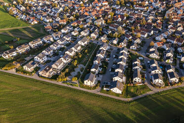 Germany, Baden-Wurttemberg, Waiblingen, Aerial view of suburban houses in new modern development area - WDF07202