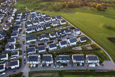 Germany, Baden-Wurttemberg, Waiblingen, Aerial view of suburban houses in new modern development area - WDF07206