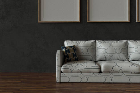 Three dimensional render of white sofa with empty picture frames hanging behind - GCAF00255