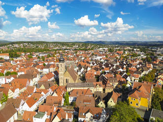 Germany, Bavaria, Forchheim, Aerial view of old town with St. Martin church in center - TAMF03832