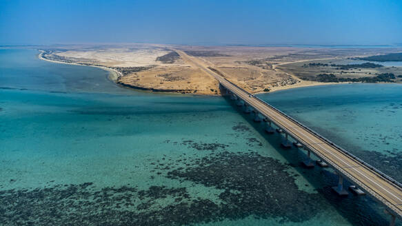 Saudi Arabia, Jazan Province, Aerial view of bridge linking two islands in Farasan Islands archipelago - RUNF04859