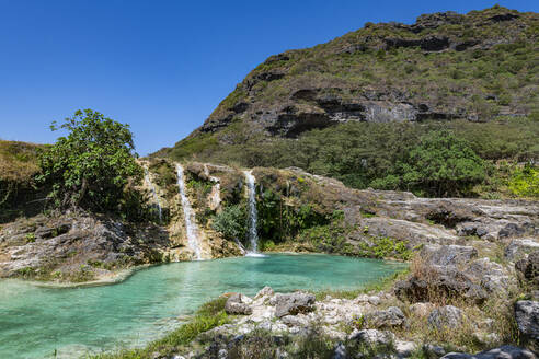 Oman, Dhofar, Salalah, Turquoise pond and waterfalls of Wadi Darbat river - RUNF04899