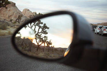 Wing mirror of car driving on highway - FOLF11946