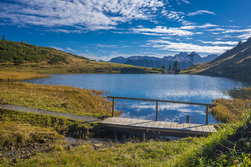 Footbridge by Schlappoldsee lake on sunny day - MHF00687