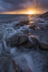 France, Brittany, Rocky coastline of Pointe Saint-Mathieu headland at sunset - RUEF03911