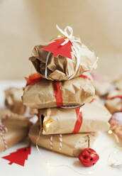 Stack of wrapped Christmas presents - ONAF00343