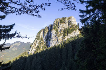 Tranquil view of mountain peak under blue sky - MAMF02396