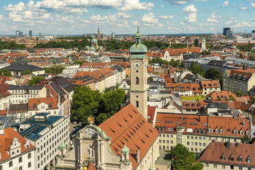 Germany, Munich, Heilig-Geist-Kirche and surrounding buildings - TAMF03865