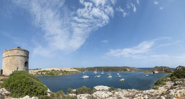 Spain, Balearic Islands, Mahon, Mola Fortress with sailboats in background - AMF09824