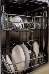 Kitchen utensils in dishwasher at home - ANAF00895