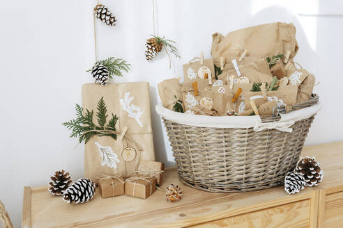 Decorated paper bags for DIY advent calendar and kept in basket - SSYF00040