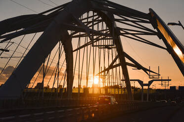 Netherlands, North Holland, Amsterdam, Enneus Heerma Bridge at sunset - FDF00340