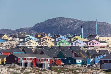 A view of colorfully painted houses in the city of Ilulissat, Greenland, Denmark, Polar Regions - RHPLF23578