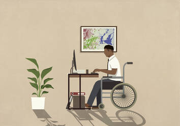 Man in wheelchair working at computer in home office - FSIF06218