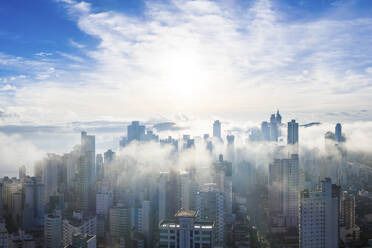 Aerial view of mist covering the city of Bal. Cambori√∫ early morning, Brazil. - AAEF17150