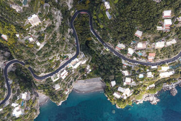 Aerial view of a scenic road in Positano on the Amalfi Coast drive, Salerno, Campania, Italy. - AAEF17197