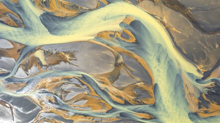 Aerial view of abstract water formation near Olfusa river bank in Iceland. - AAEF17302