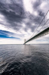 Mackinac Suspension Bridge crossing the straits of Mackinac connecting upper and lower peninsula of the US State of Michigan, USA - SMAF02525
