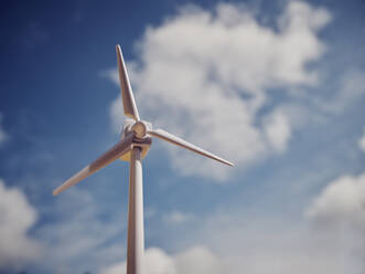 Wind turbine model in front of cloudy sky - PWF00698