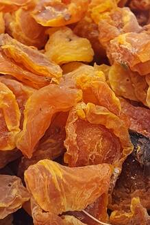 Close-up full frame of dried apricots - NGF00793