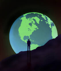 Illustration of isolated man looking at planet Earth - GWAF00023