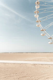 Ferris wheel at beach on sunny day - CHPF00871