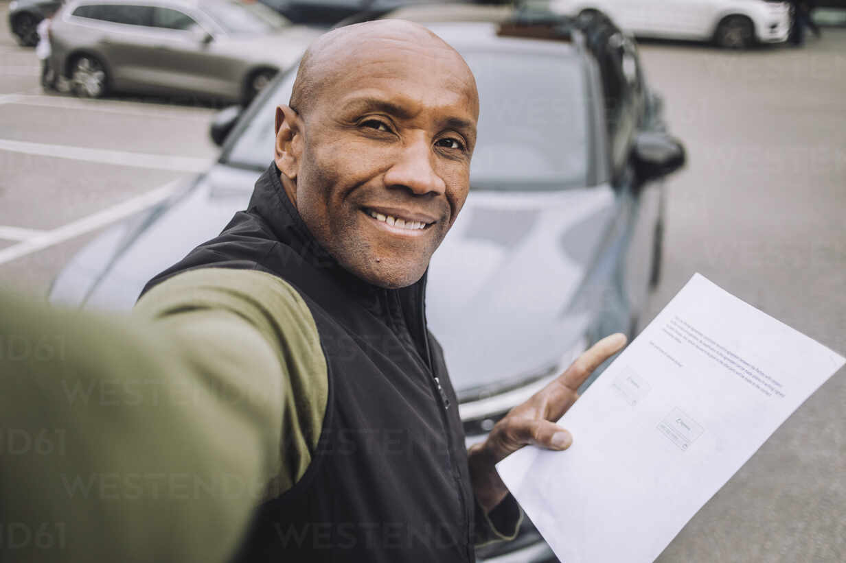 Young Man Poses With His Car. Stock Photo, Picture and Royalty Free Image.  Image 130497369.
