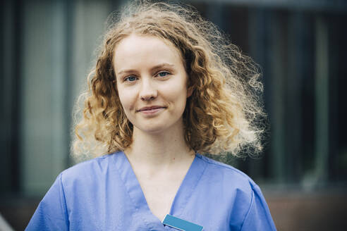 Portrait of smiling female nurse with blond hair - MASF35301