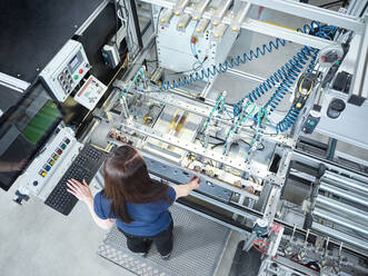 Young technician working at factory - CVF02300