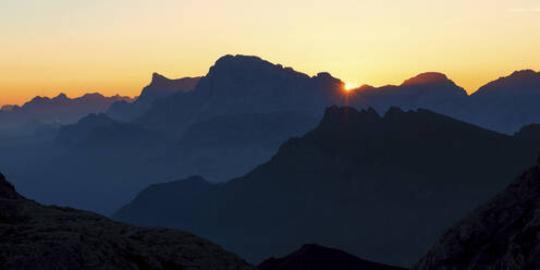 Silhouette of mountain ranges at sunrise, Dolomites, Italy - ALRF02073